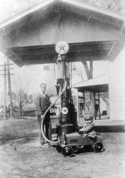 1925-charlie-johnson-with-daughter-mary-virginia-getting-gas-at-johnsons-store-img098